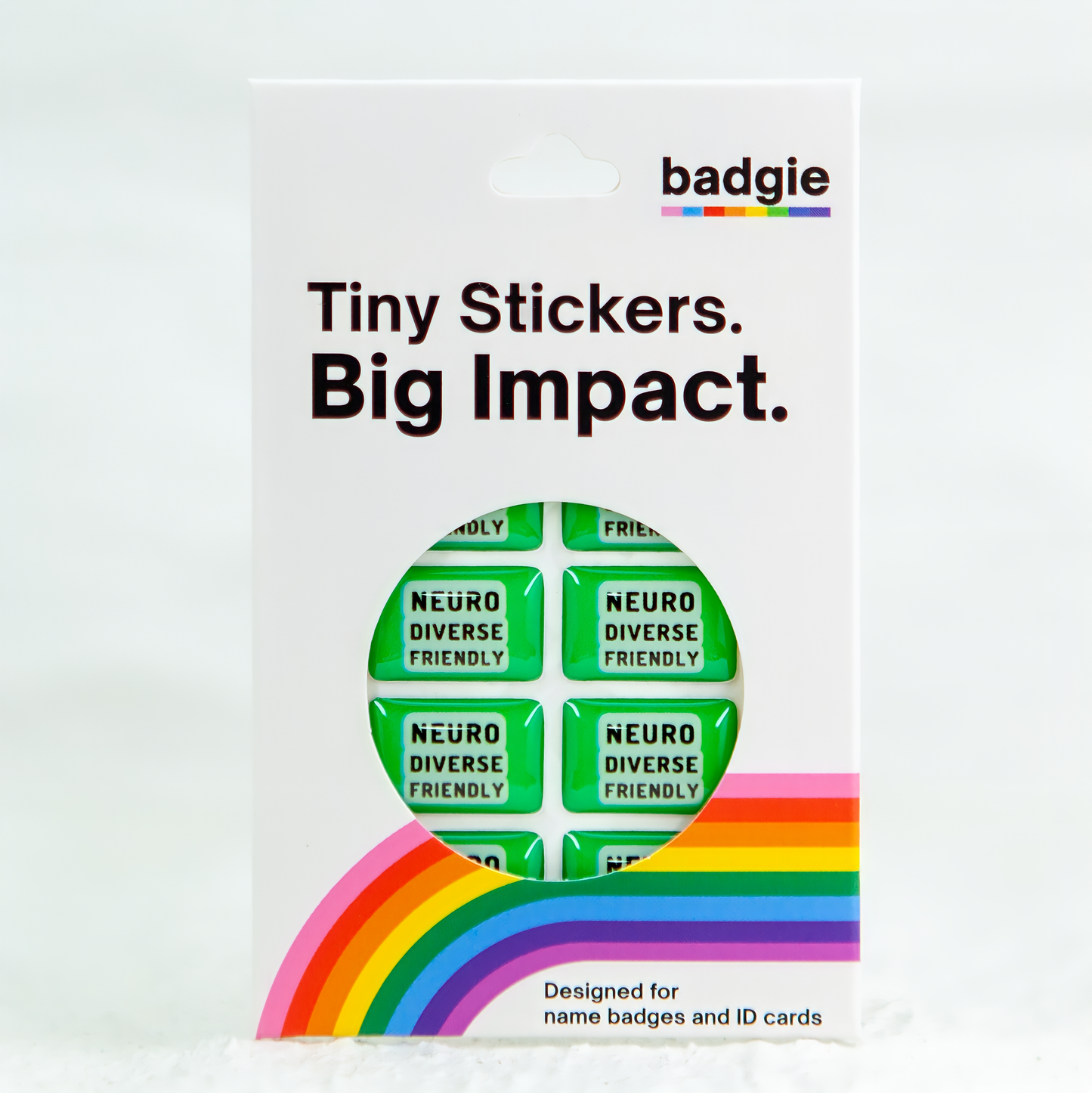 A retail package containing eight green neurodivergent stickers, each labeled 'Neurodiverse Friendly'