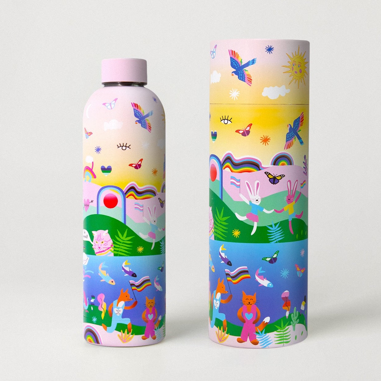 Badgie Be Yourself Steel Water Bottle BPAFree. Product image of steel bottle bpafree standing next to the rainbow lgbt pride gay packaging, best water bottle of 2024, against white background.