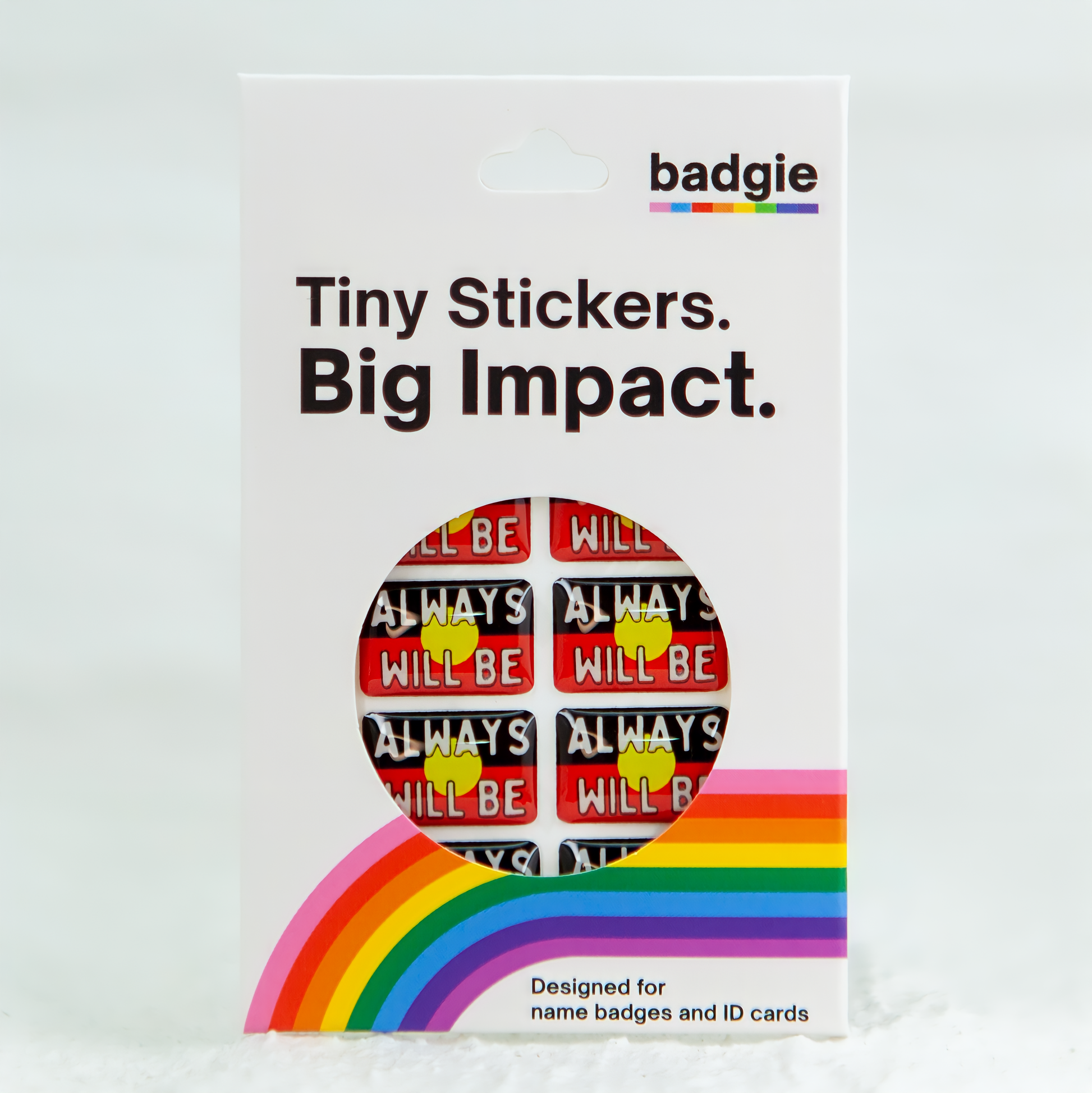 Badgie Always Will Be Aboriginal Land Sticker 8 Pack in the Packaging - Small, durable epoxy resin sticker with bright colors, designed for name badges and ID tags to support Aboriginal and Torres Strait Islander peoples.
