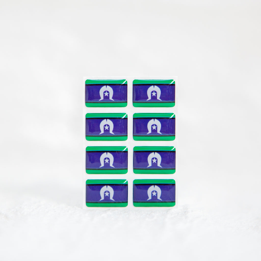 A high-quality sticker displaying the Torres Strait Island Flag, designed for name badges and ID tags. The perfect Torres Strait Islander sticker for showing pride.